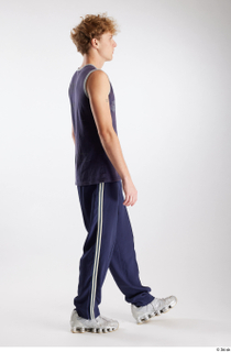 Urien  1 blue tank top blue track pants dressed…